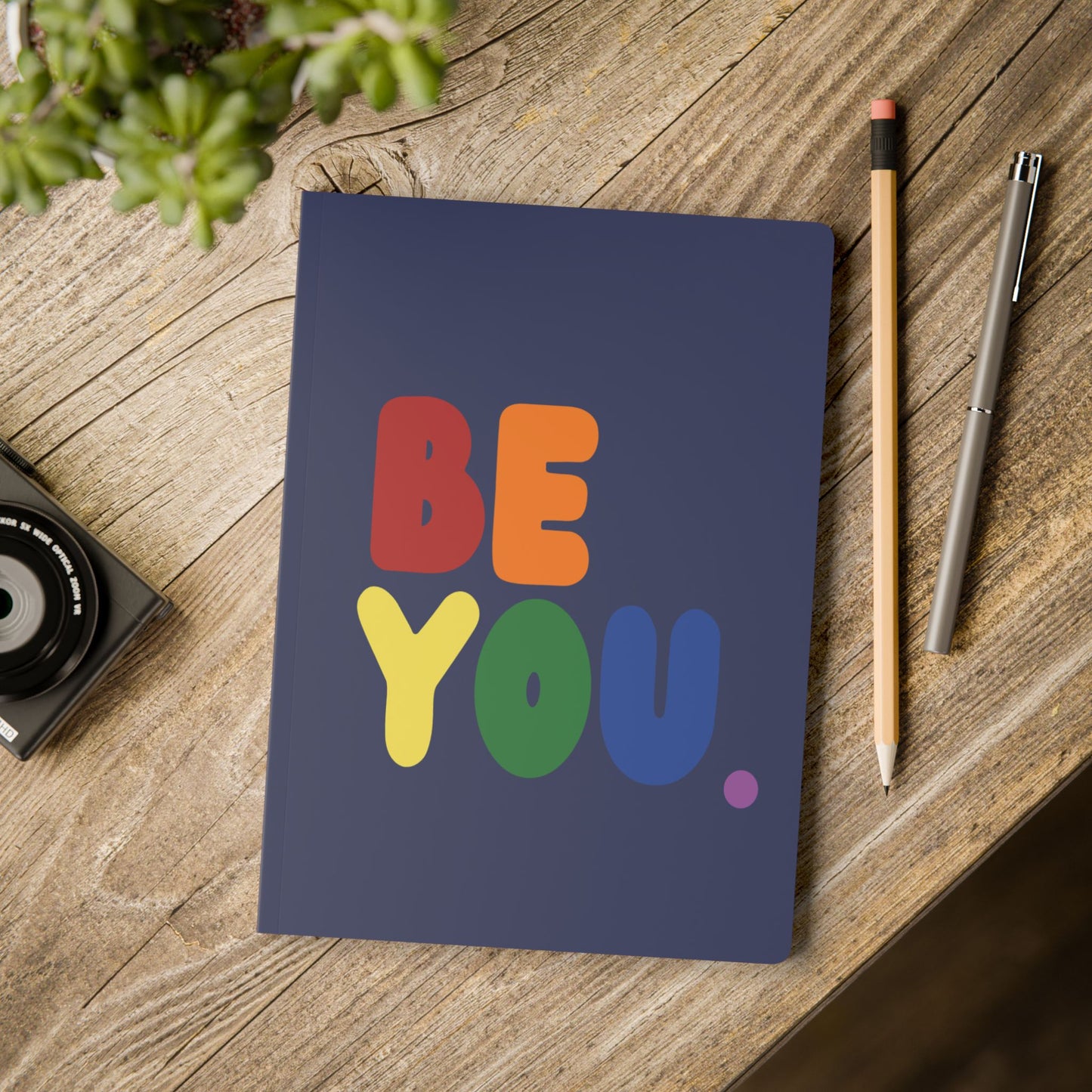 The Rainbow Be You Soft Cover Journal on a table - The APWT Gift Shop