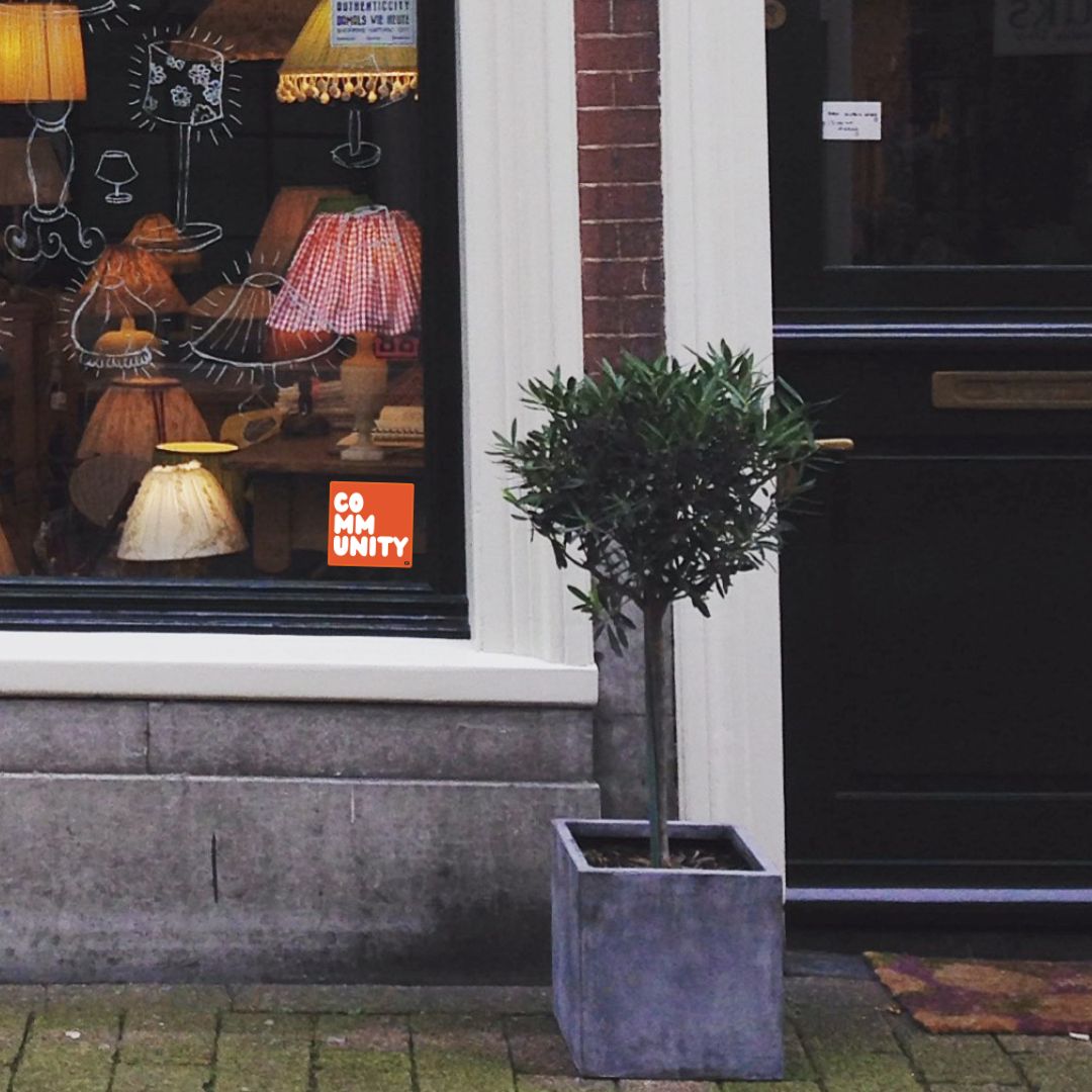 A Community in Tangerine Vinyl Sticker