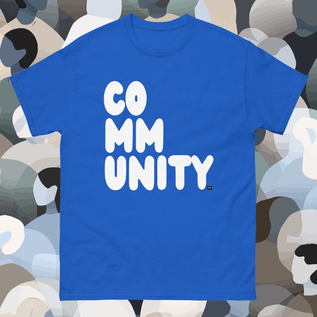 Blue t-shirt with 'COMMUNITY' text on a background of abstract shapes