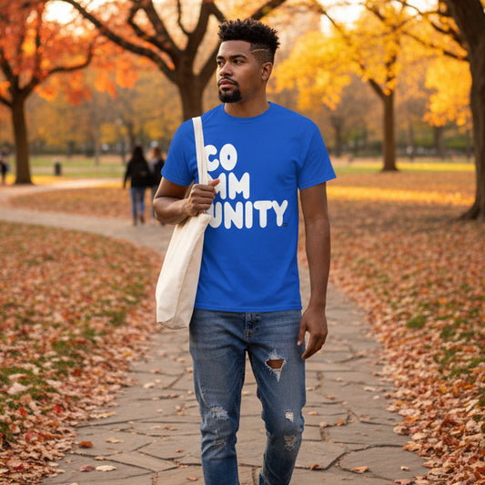 Man wearing A Community in Ocean Blue Unisex T-Shirt from the APWT Gift Shop