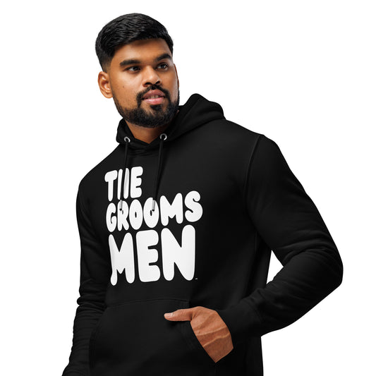 Man wearing The Groomsmen Premium Unisex Hoodie in Black