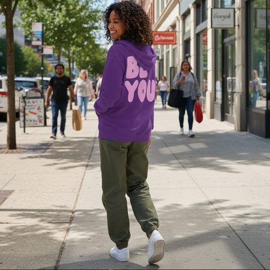 Woman wearing Be You in Purple and Pink Unisex Zip-Up Hoodie