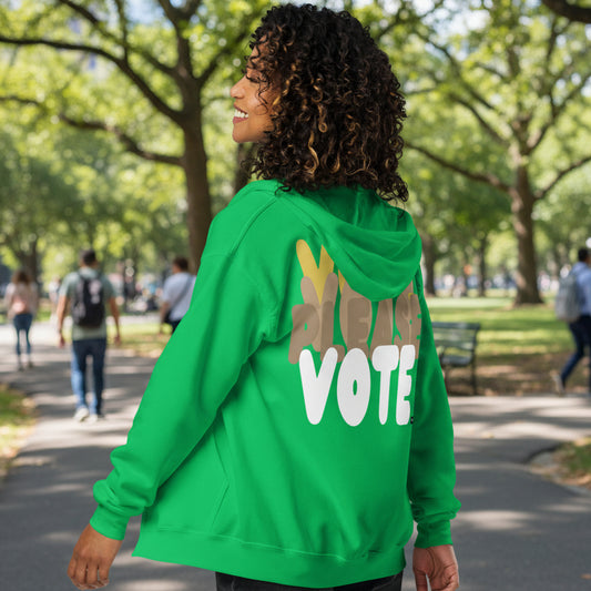 Woman wearing Please Vote in Green Spaces Unisex Zip-up Hoodie from the APWT Gift Shop