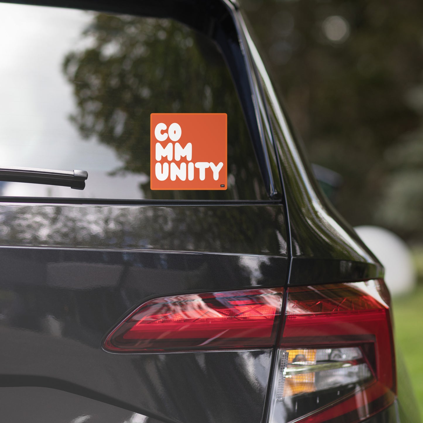 A Community in Tangerine Vinyl Sticker