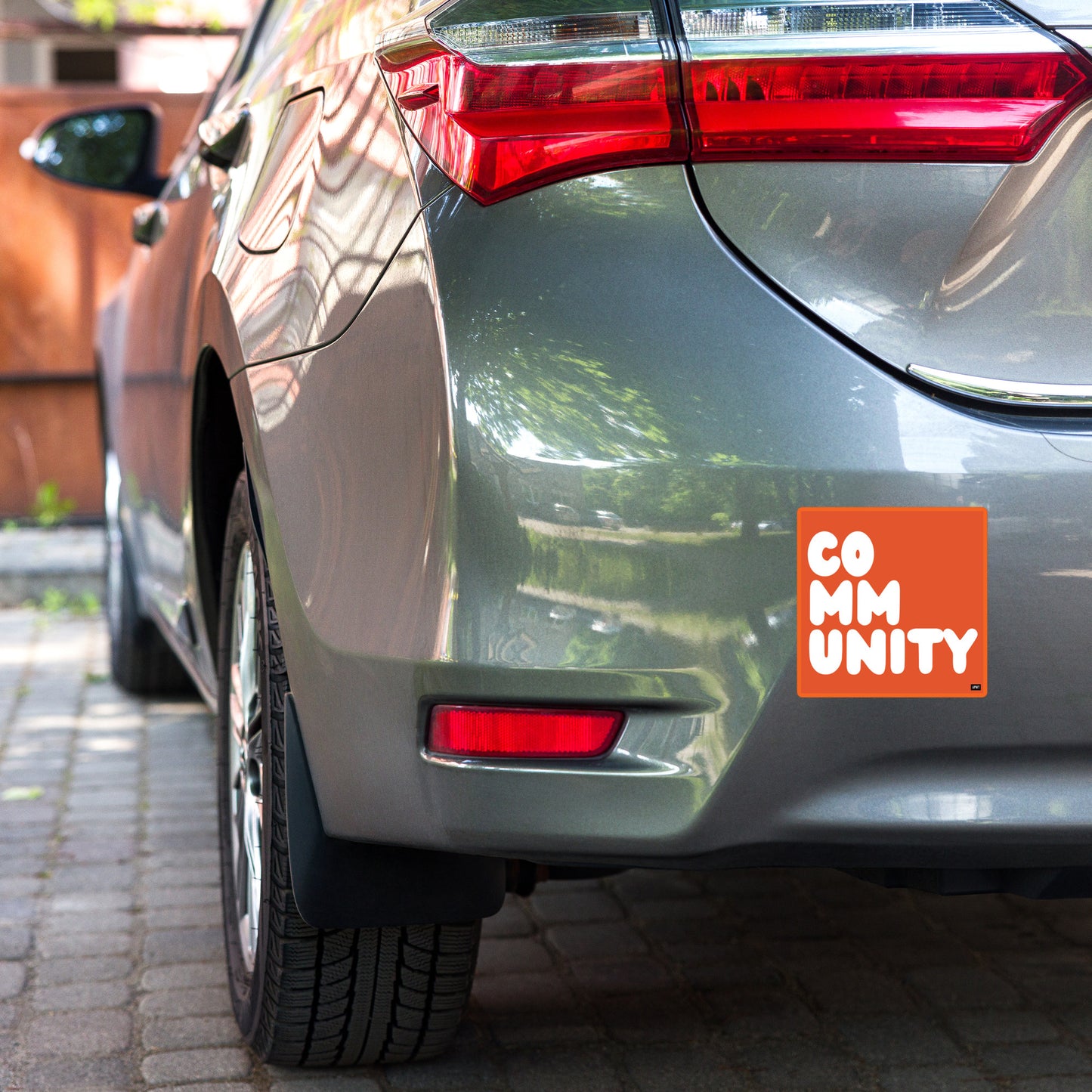 A Community in Tangerine Vinyl Sticker