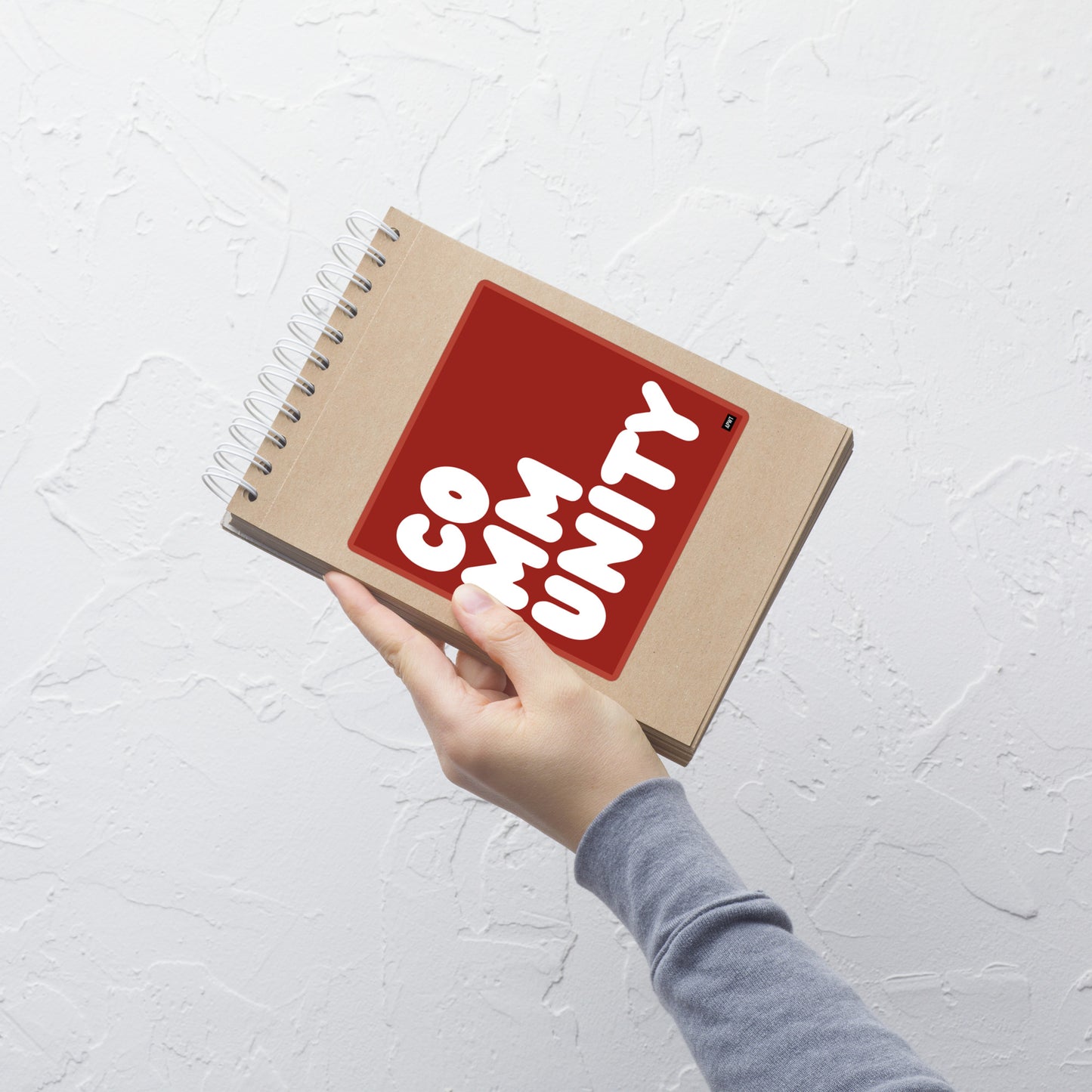A Community in Apple Red Vinyl Sticker
