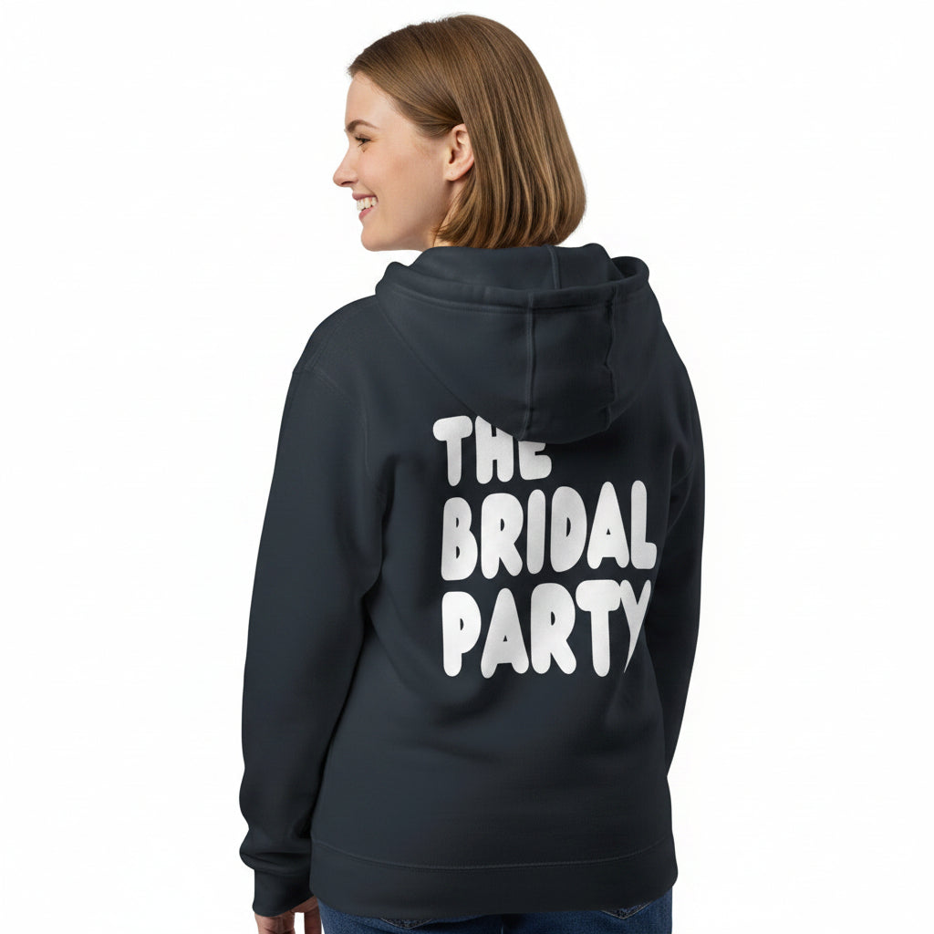 Woman wearing the APWT Gift Shop's the Bridal Party Premium Unisex Zip-Up Hoodie from the APWT Wedding Shop in Navy Blue
