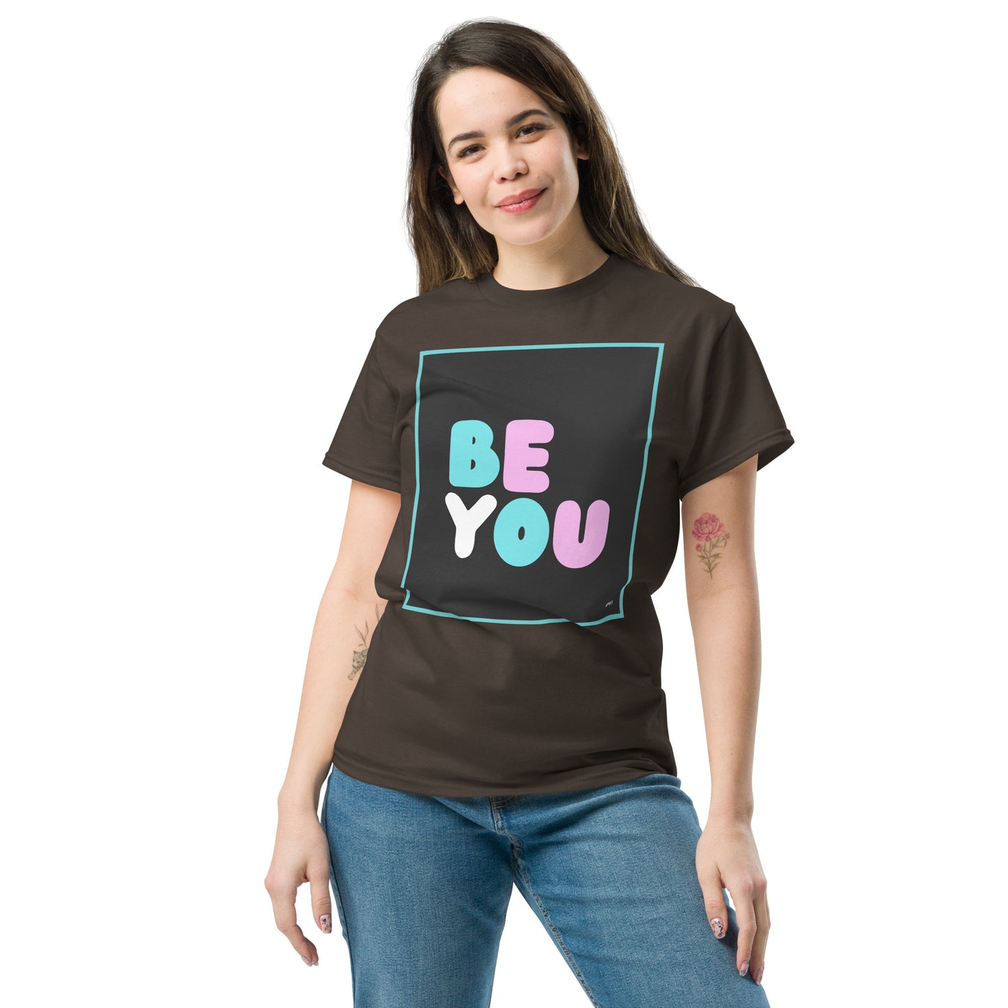 Woman wearing the Be You T Unisex T-Shirt in Brown - The APWT Gift Shop