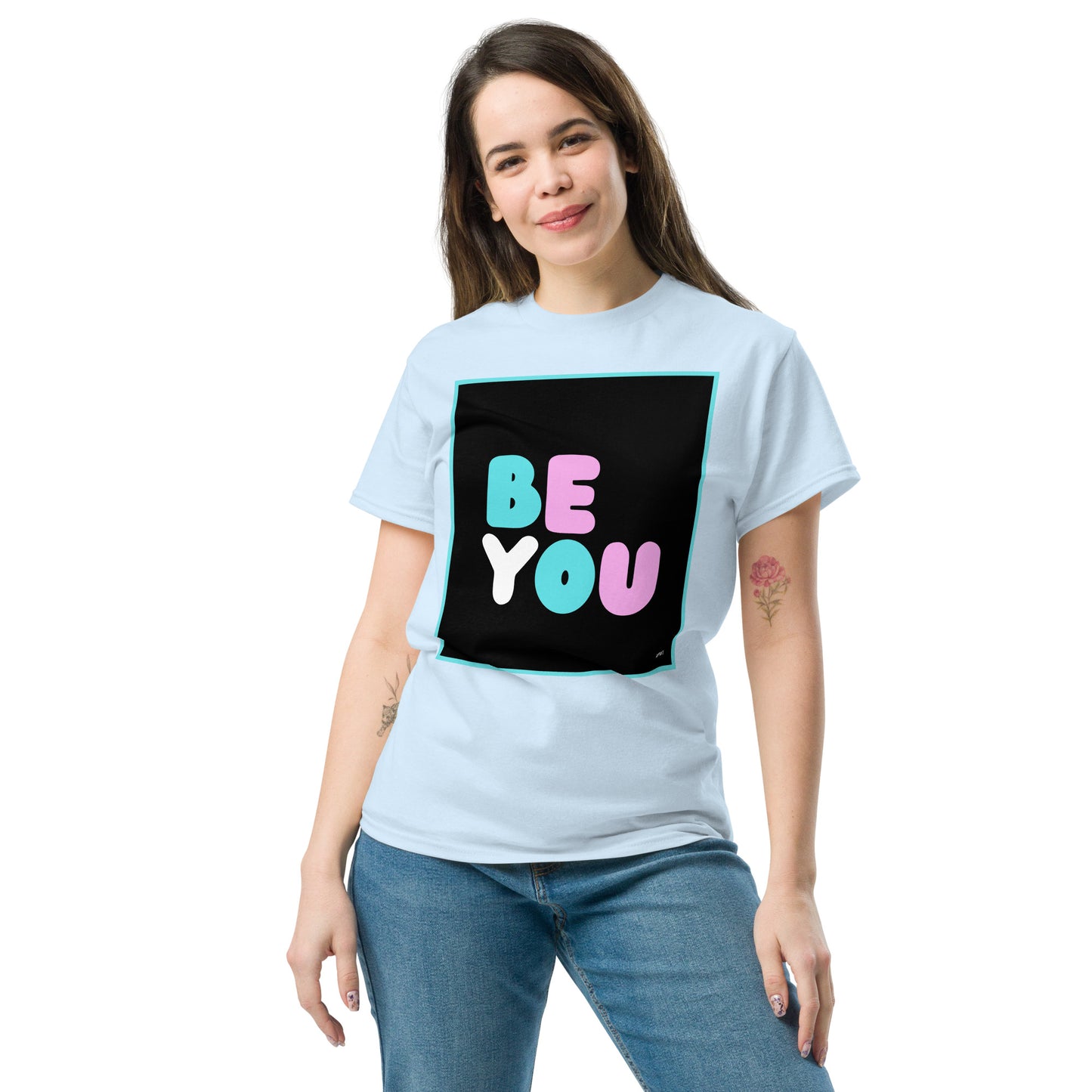 Woman wearing the Be You T Unisex T-Shirt in Light Blue - The APWT Gift Shop