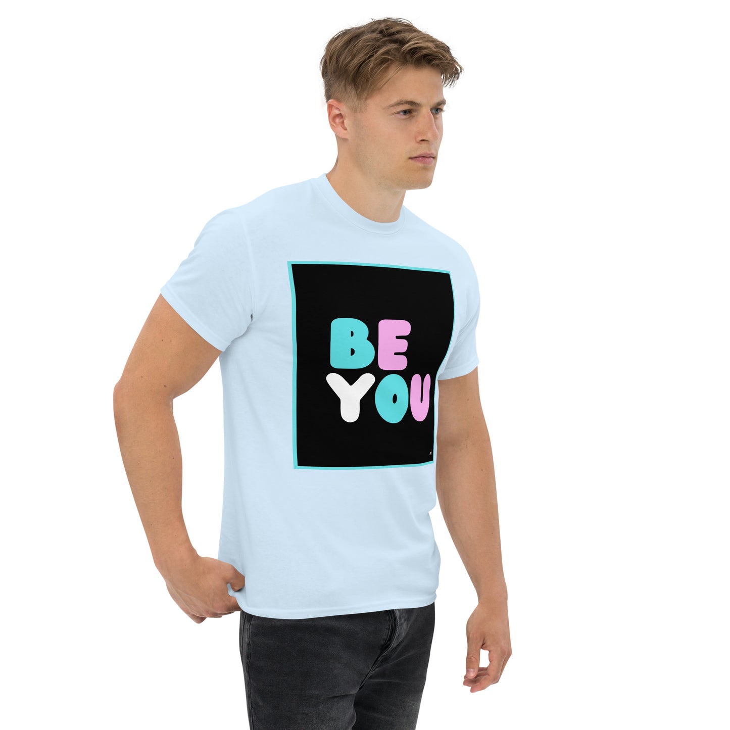 Man wearing the Be You T Unisex T-Shirt in Light Blue (1 of 3) - The APWT Gift Shop