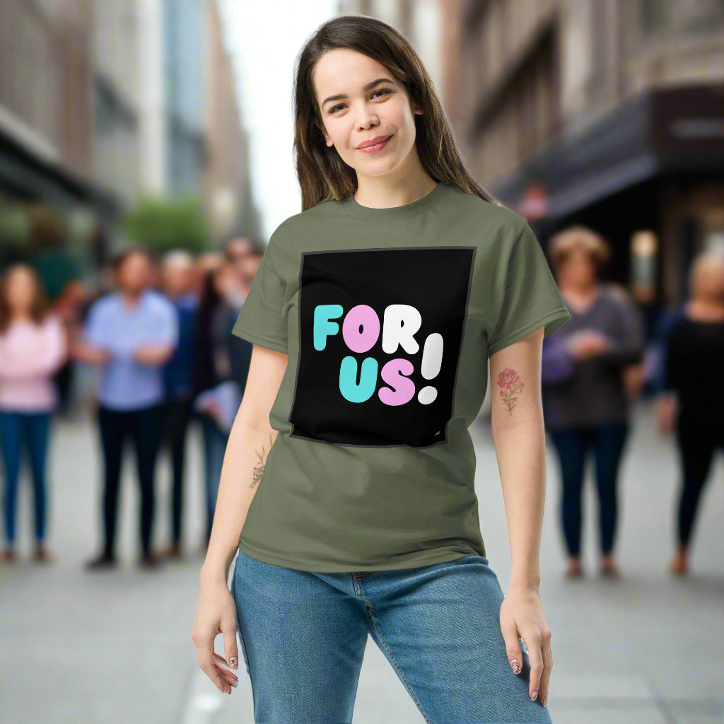 A woman wearing the For Us with a T Unisex T-Shirt in Military/Army Green in front a group of people - The APWT Gift Shop