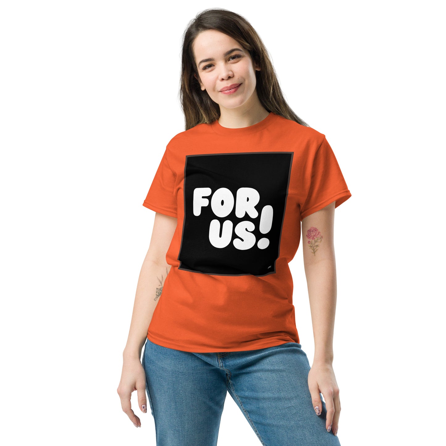 Woman wearing the For Us in Black and White Unisex T-Shirt in Orange - The APWT Gift Shop