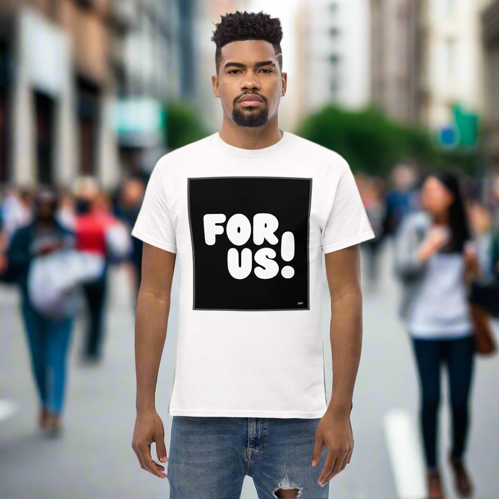 Man wearing the For Us in Black and White Unisex T-Shirt in White standing on a city street - The APWT Gift Shop