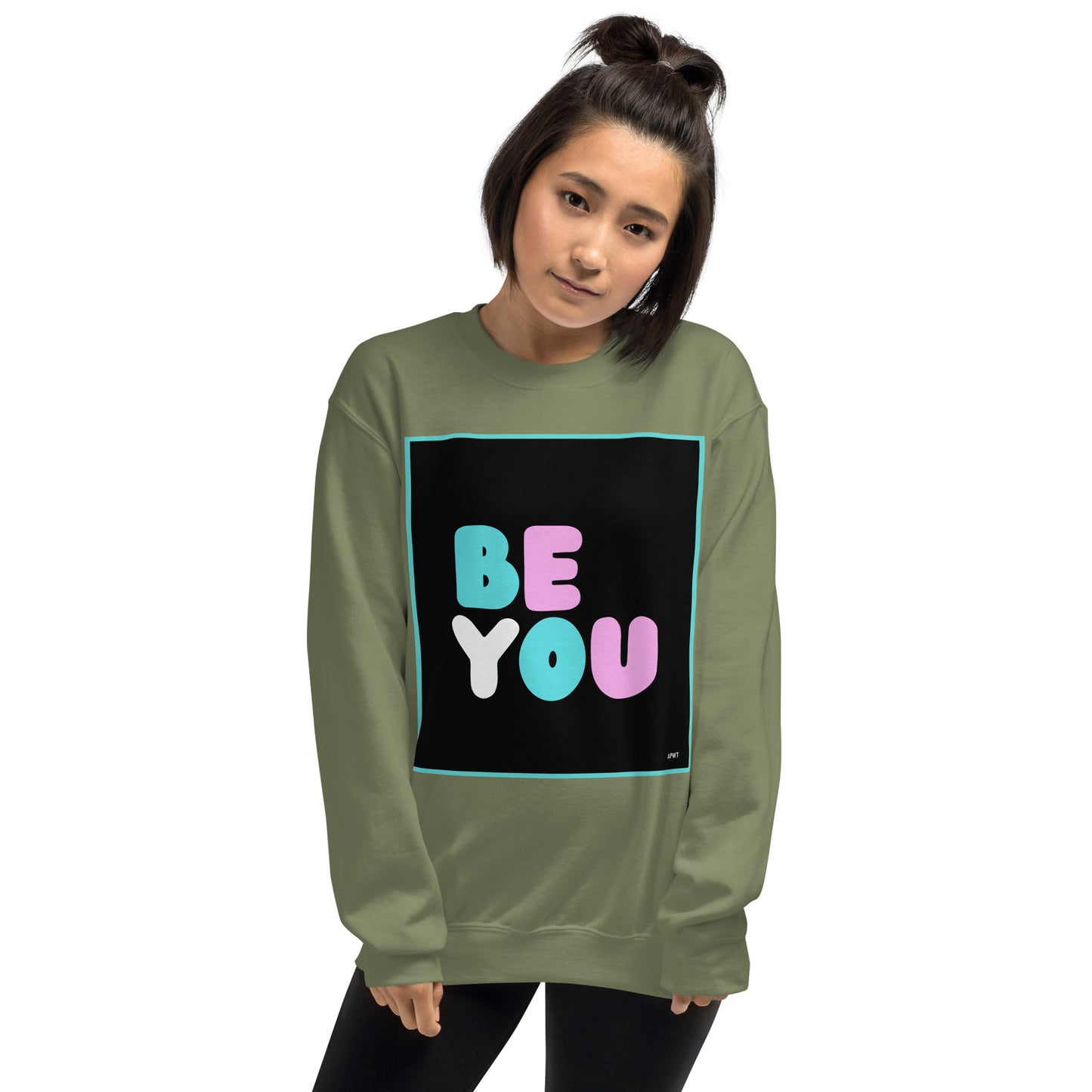Woman wearing the Be You T Unisex Crew Neck Sweatshirt in Military/Army Green (1 of 2) - The APWT Gift Shop