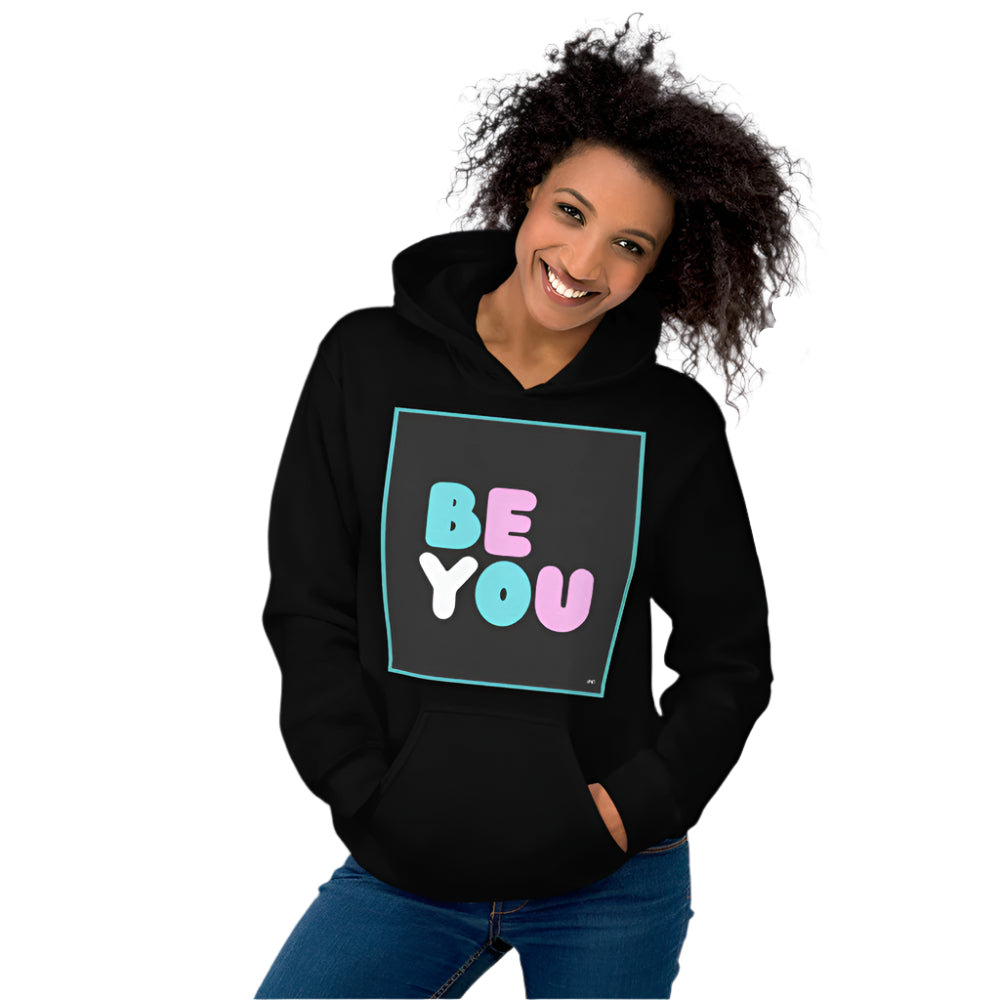 Woman wearing the Be You T Unisex Hoodie in Black - The APWT Gift Shop