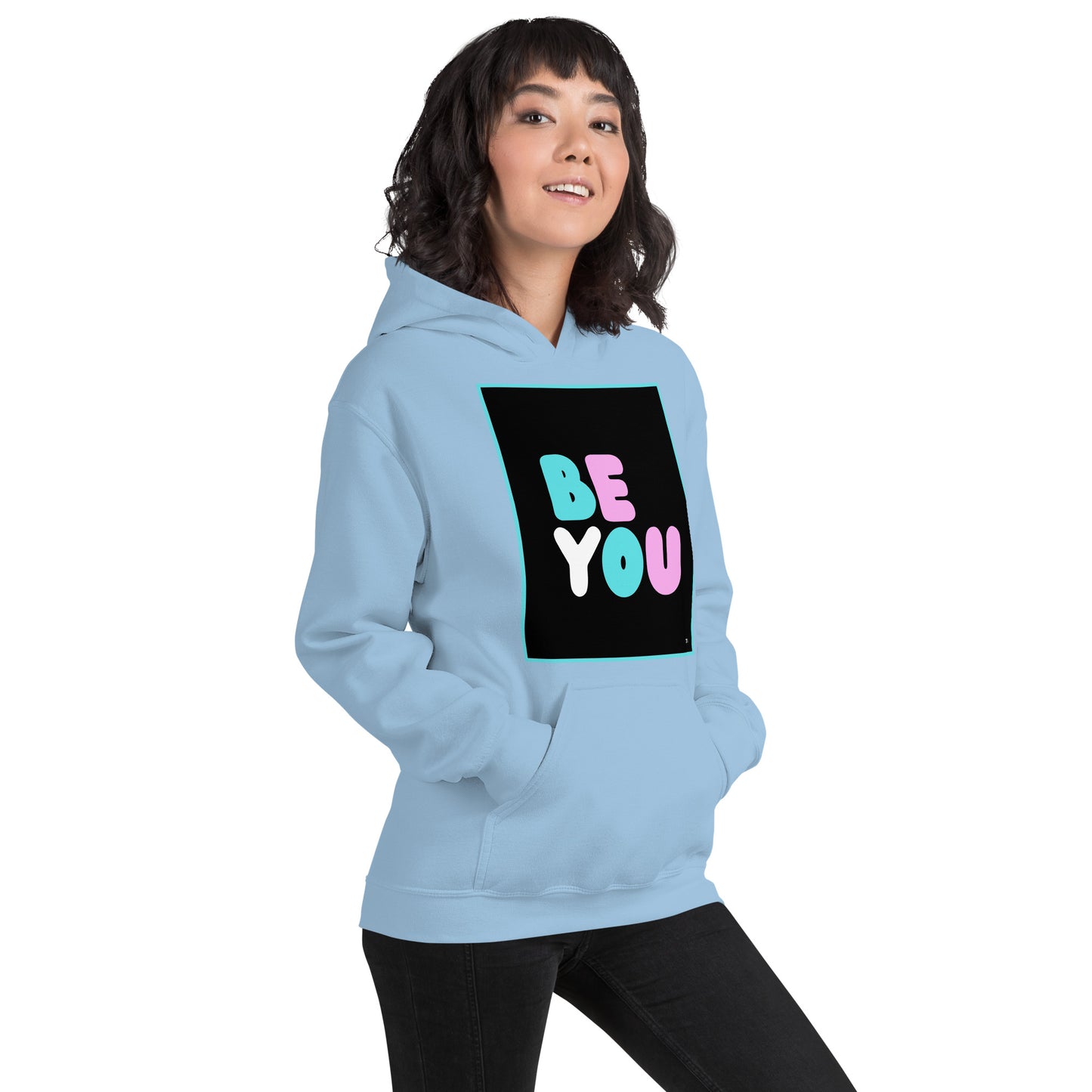 Woman wearing the Be You T Unisex Hoodie in Light Blue (1 of 2) - The APWT Gift Shop