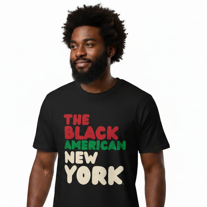Woman wearing the APWT Gift Shop's the Black American New York Premium Unisex T-Shirt from the Black Collection