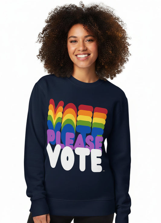 Woman wearing the APWT Gift Shop's Please Vote in Color Premium Unisex Sweatshirt