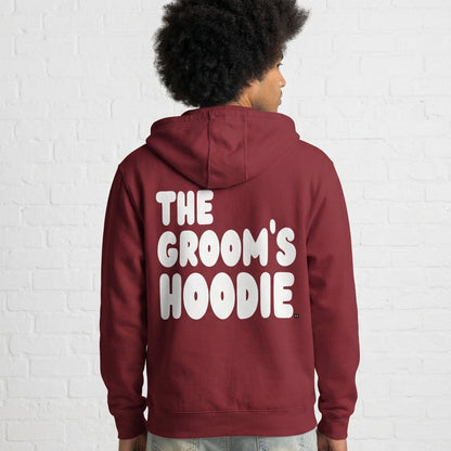 Man wearing the Groom's Hoodie Premium Unisex Zip-Up Hoodie From the APWT Wedding Shop in Burgundy - Back View