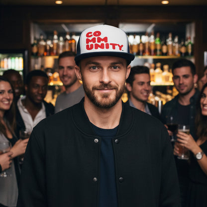 A Community in Balloon Red Trucker Hat - Available in Assorted Colors