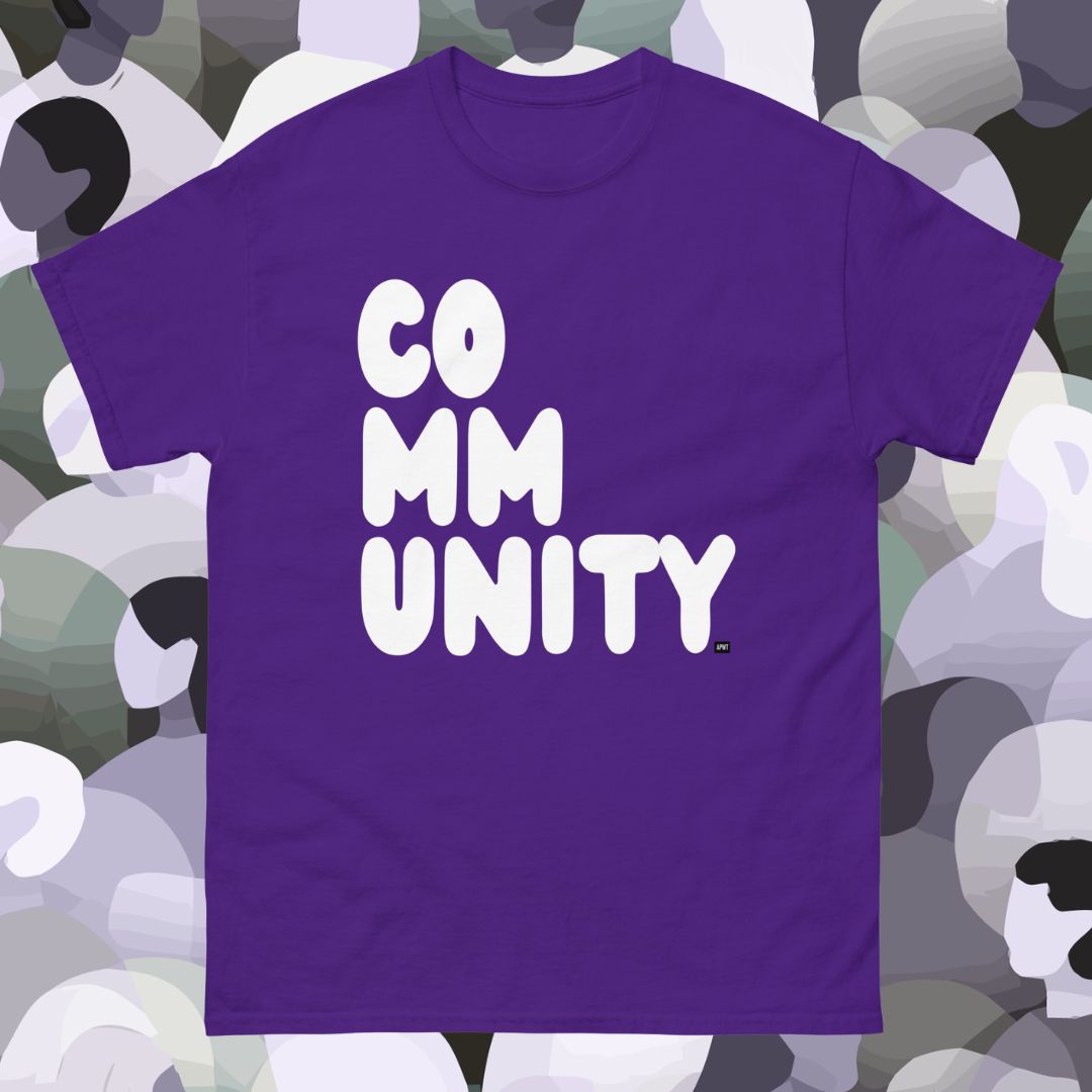 Purple t-shirt with 'COMMUNITY' text on a multicolored abstract background