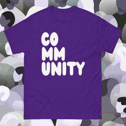 Purple t-shirt with 'COMMUNITY' text on a multicolored abstract background