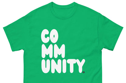 The APWT Gift Shop's A Community in Green Grass Unisex T-Shirt from the Community Collection - Front Close-Up