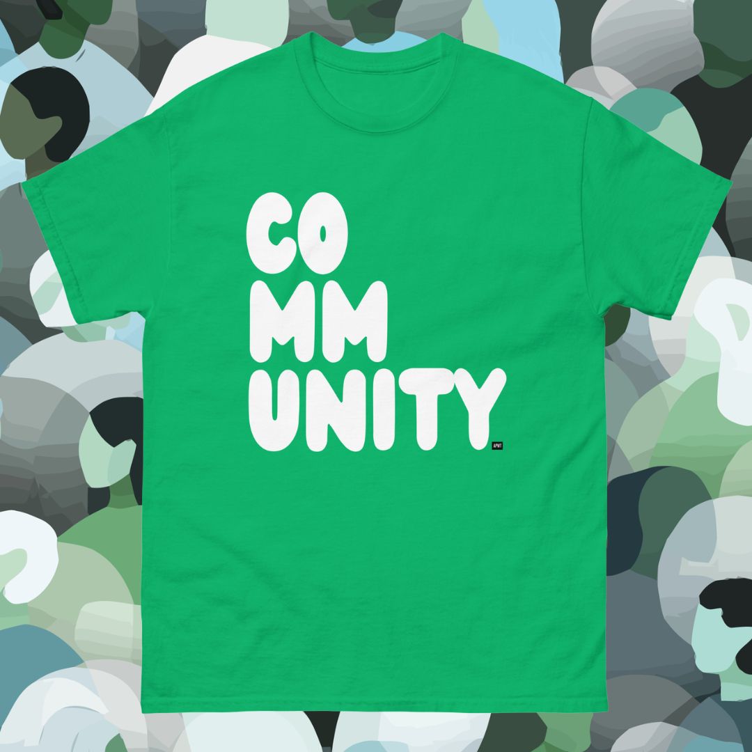 Green t-shirt with 'COMMUNITY' text on a colorful abstract background