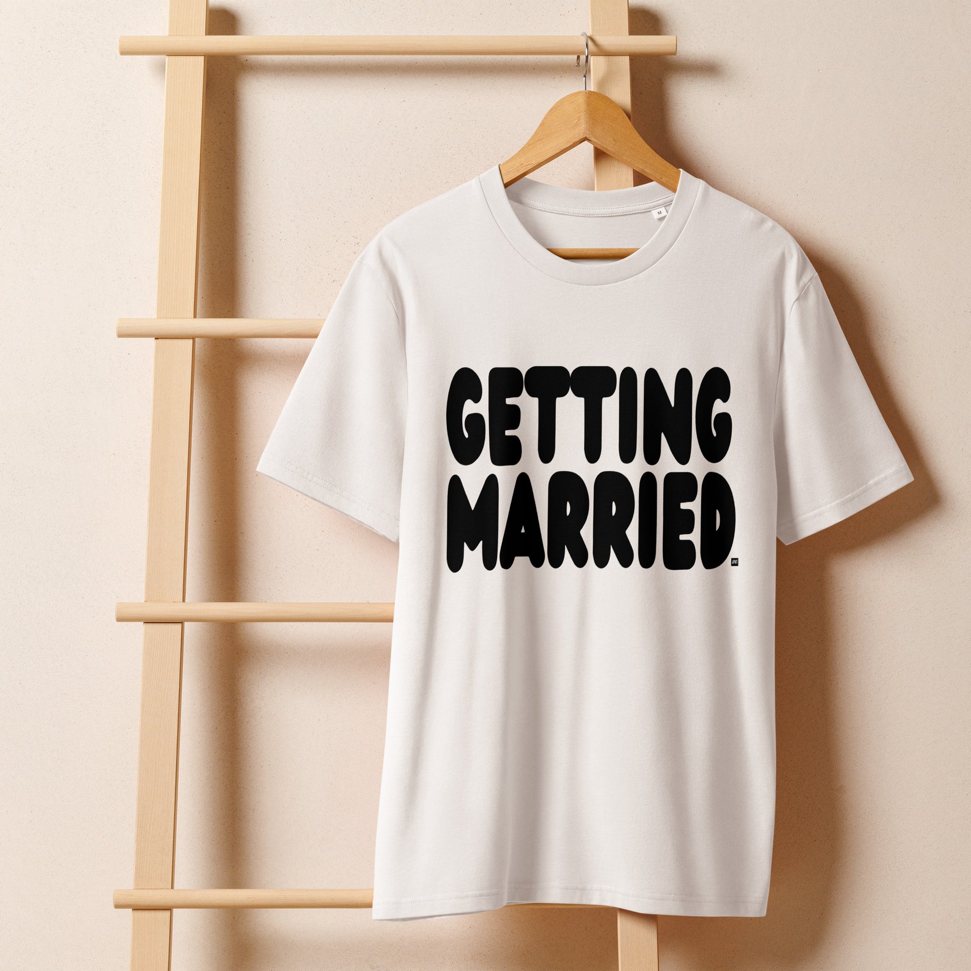 Getting Married Premium Unisex White T-Shirt on a hanger