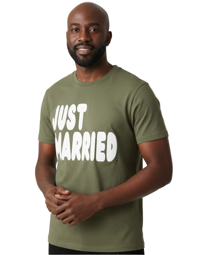 Man wearing the APWT Gift Shop's Just Married Premium Unisex T-Shirt from the APWT Wedding Shop