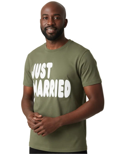 Man wearing the APWT Gift Shop's Just Married Premium Unisex T-Shirt from the APWT Wedding Shop