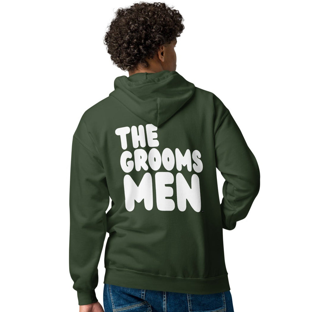 Man modeling The Groomsmen Unisex Zip-Up Hoodie in Forest Green