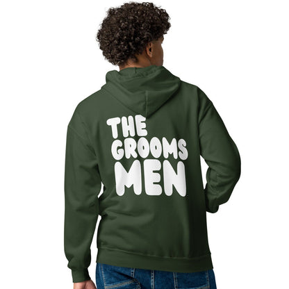 Man modeling The Groomsmen Unisex Zip-Up Hoodie in Forest Green