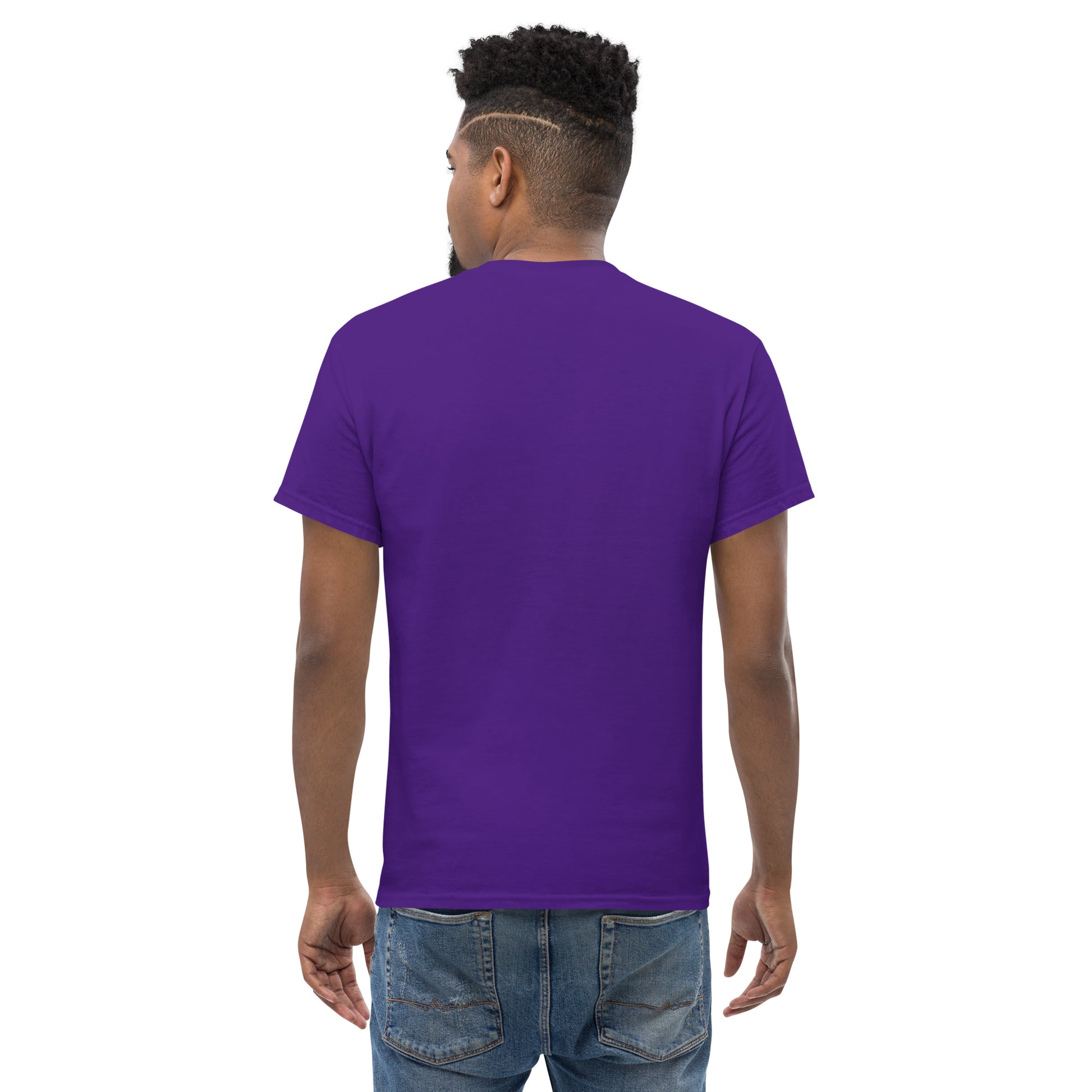 Man wearing A Community in Purple Flowers Unisex T-Shirt from the APWT Gift Shop Back