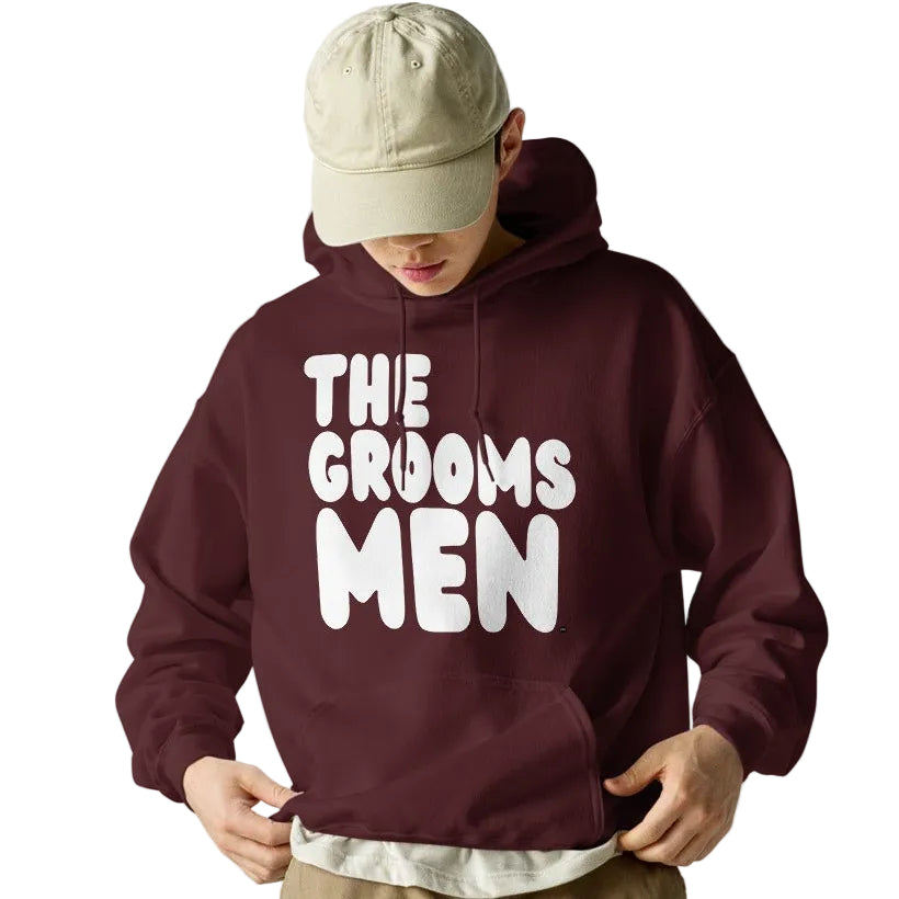 Man wearing The Groomsmen Unisex Hoodie in Maroon
