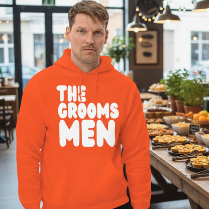Man wearing The Groomsmen Unisex Hoodie in Orange