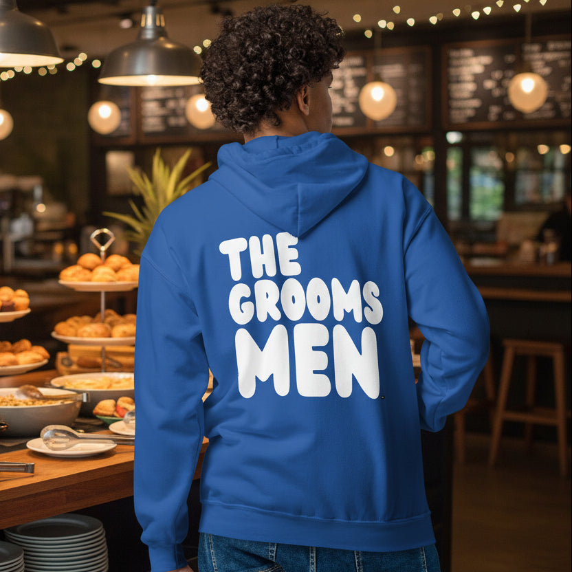 Man wearing The Groomsmen Unisex Zip-Up Hoodie in Royal Blue