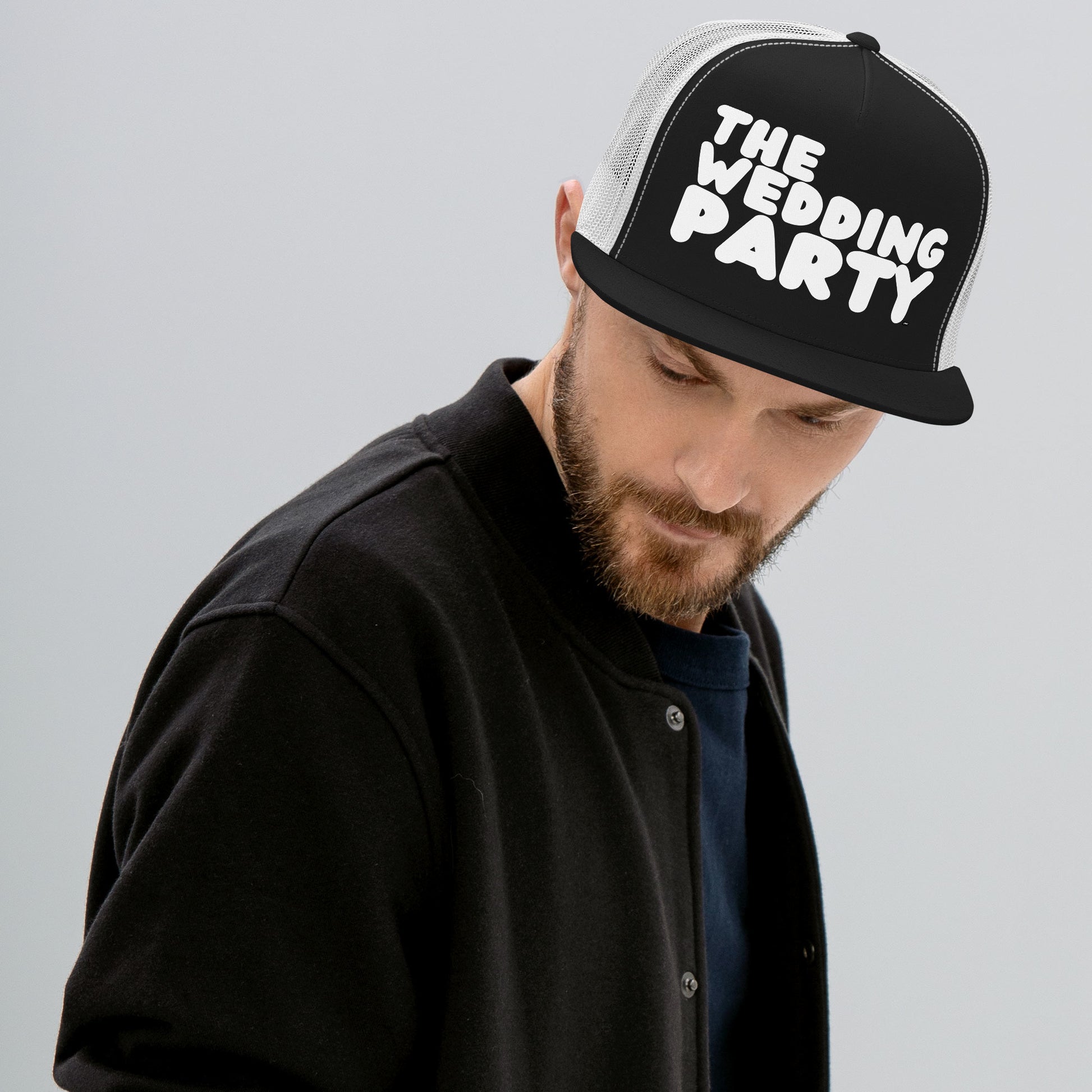 Man wearing The Wedding Party Hat in Black and White from the APWT Gift Shop