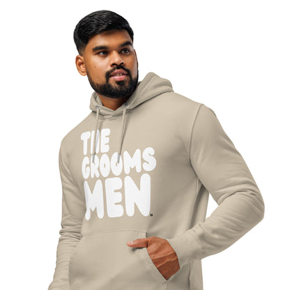 Man wearing the Groomsmen Premium Unisex Hoodie in Beige