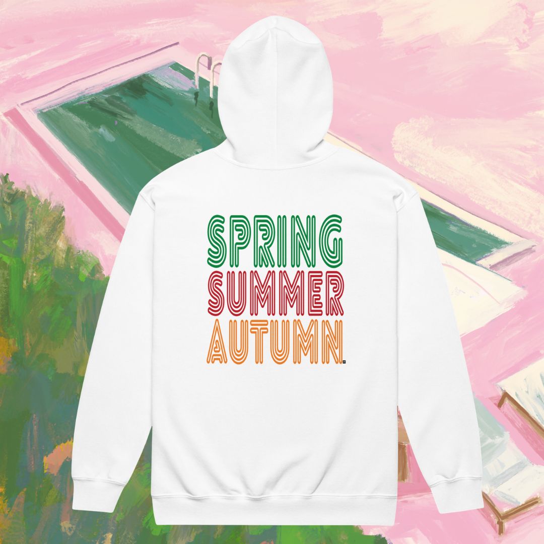White hoodie with 'Spring Summer Autumn' text on a colorful abstract background