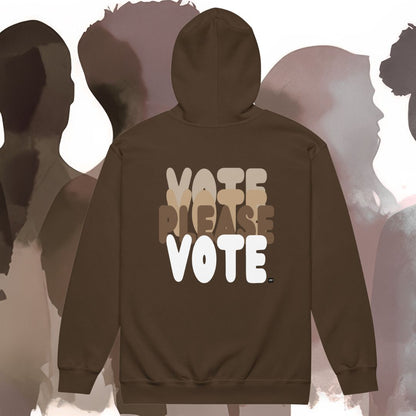 Brown hoodie with 'Vote Please Vote' text on the back against a blurred background