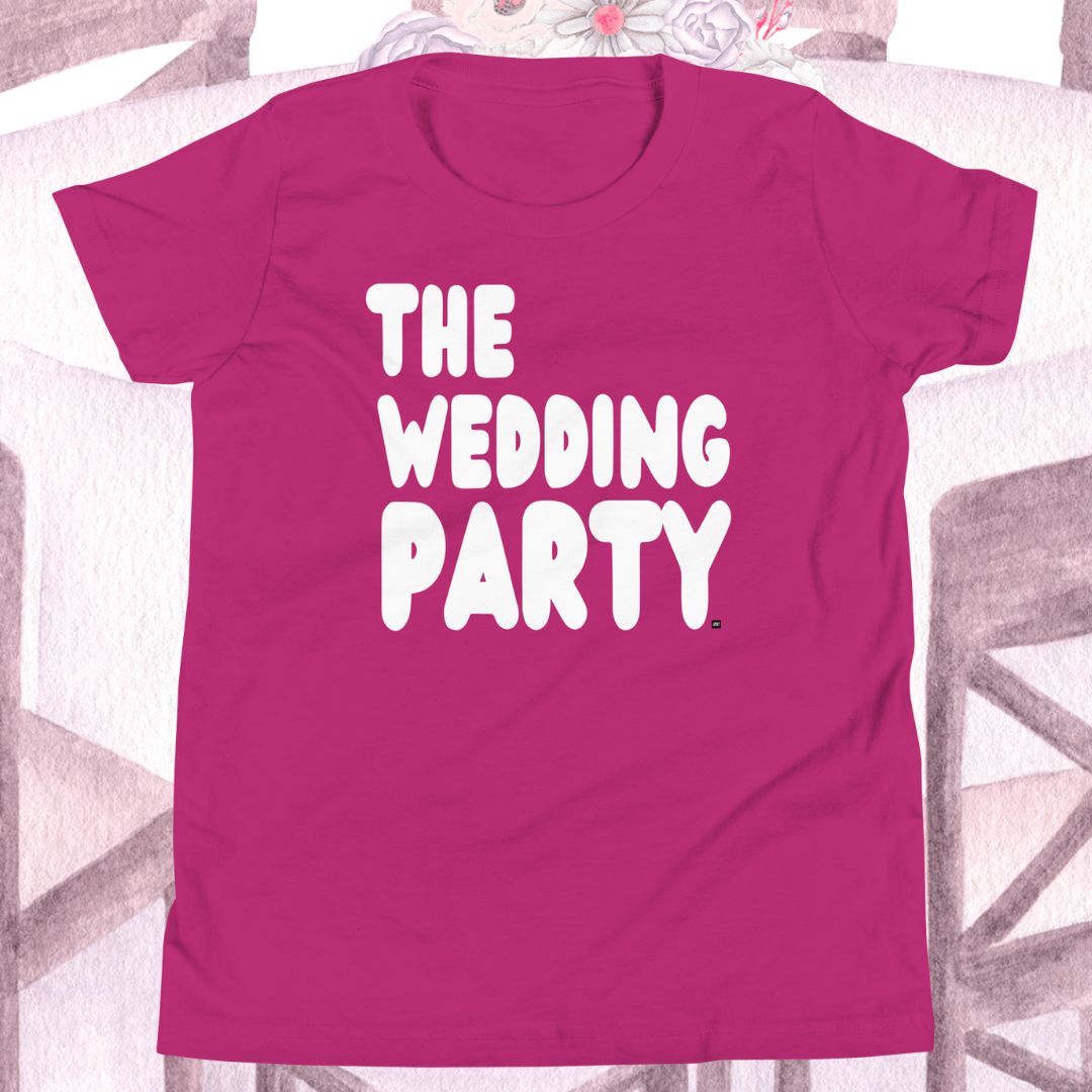 Pink t-shirt with 'THE WEDDING PARTY' text on a decorative background