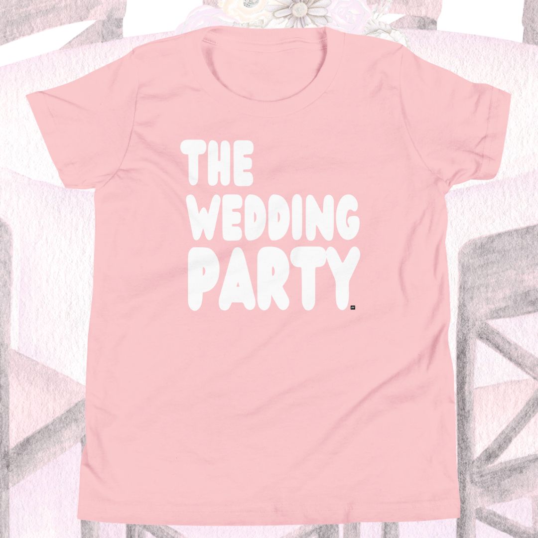 Pink t-shirt with 'THE WEDDING PARTY' text on a white background