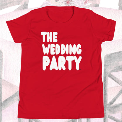 Red t-shirt with 'THE WEDDING PARTY' text on a light background