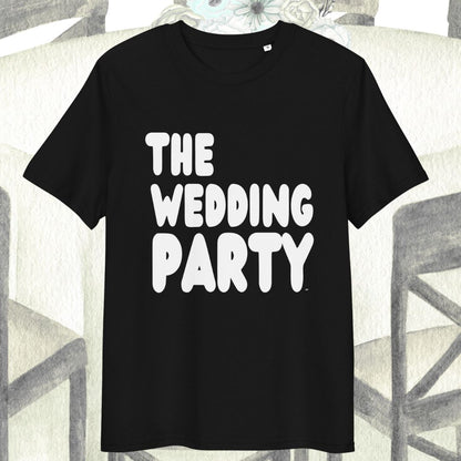 Black t-shirt with 'THE WEDDING PARTY' text on a patterned background