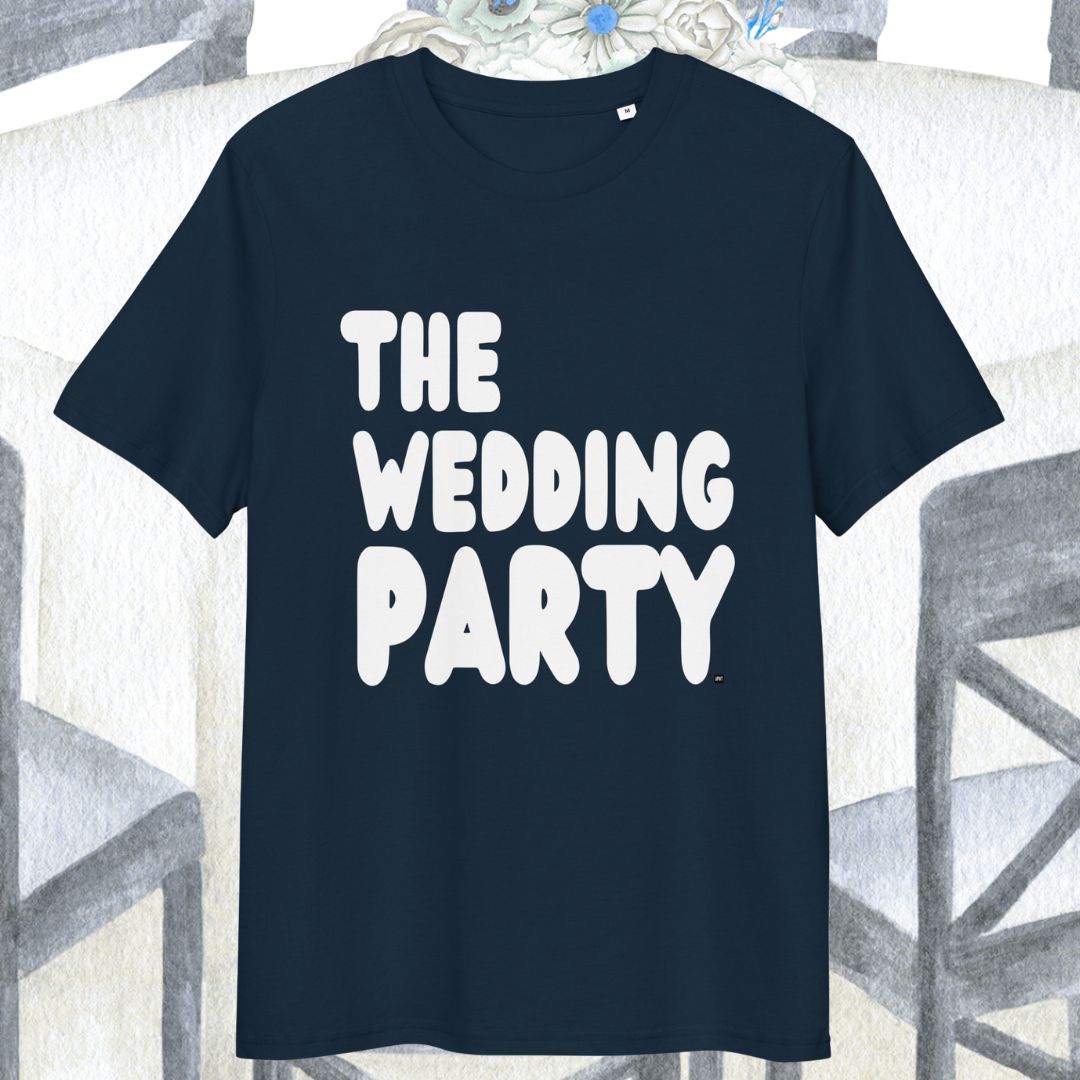 Navy blue t-shirt with 'THE WEDDING PARTY' text on a textured surface.