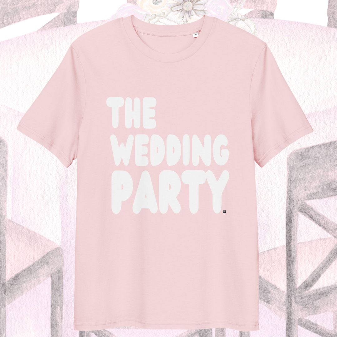 Pink t-shirt with 'THE WEDDING PARTY' text on a decorative background