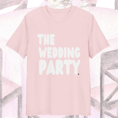Pink t-shirt with 'THE WEDDING PARTY' text on a decorative background