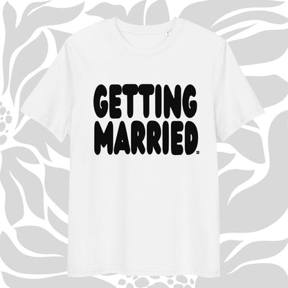 White t-shirt with 'GETTING MARRIED' text on a floral patterned background