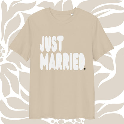 Beige t-shirt with 'JUST MARRIED' text on a beige patterned background